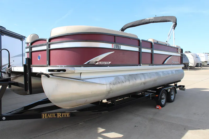 Slide: The Image of 2015 Premier 220 SunSation pontoon boat on a Haul Rite trailer. - 3