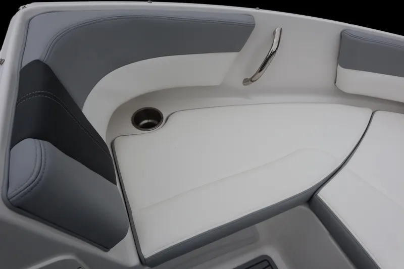 Slide: The Image of 2024 Chaparral 19 SSi OB boat interior with gray and white seating. - 10