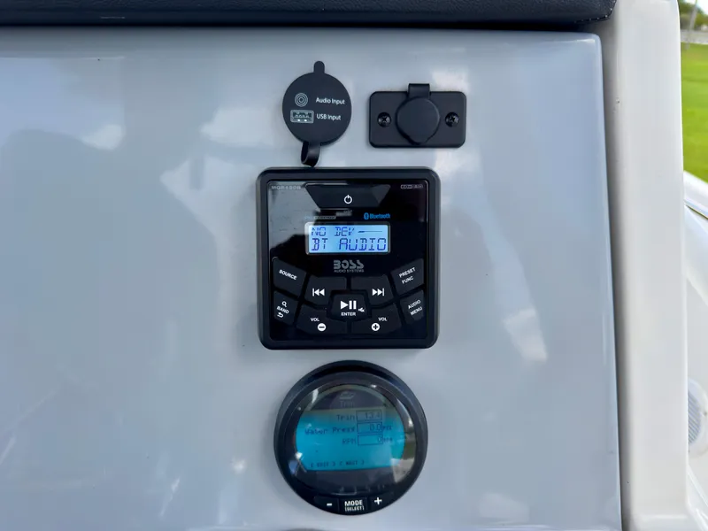 Slide: The Image of Control panel of 2023 Bayliner Trophy T24CC boat with audio and display systems. - 18