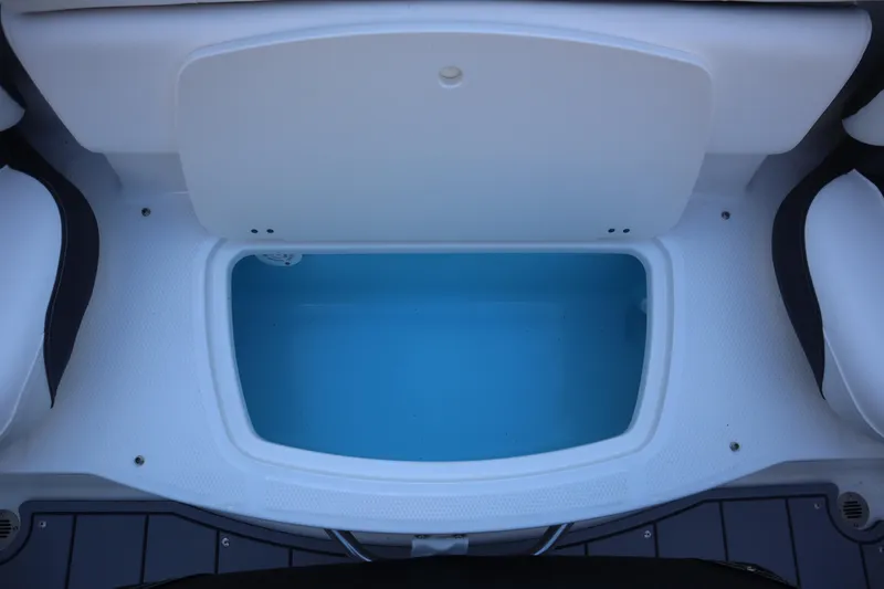 Slide: The Image of 2024 Chaparral 21 SSi Ski & Fish OB boat storage compartment, open and empty. - 17