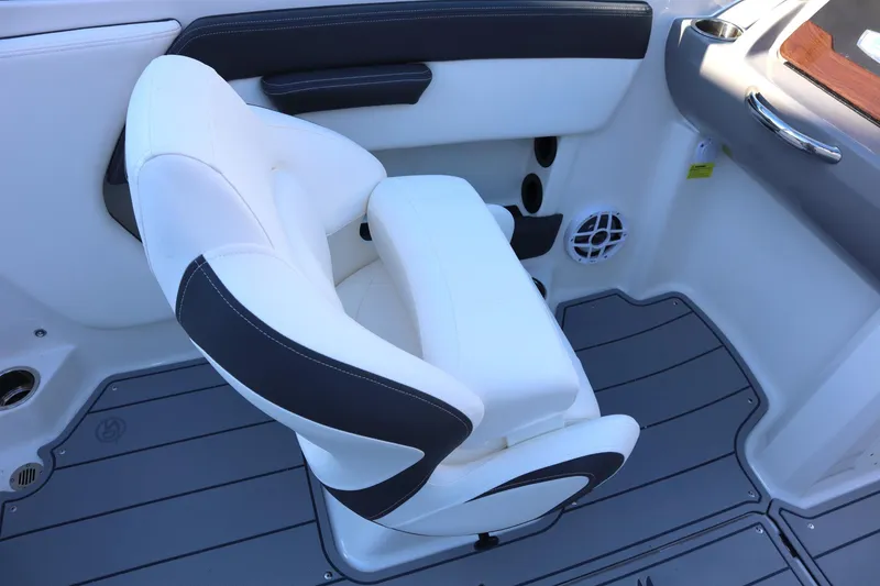 Slide: The Image of 2024 Chaparral 21 SSi Ski & Fish OB boat interior with white and black seating. - 6