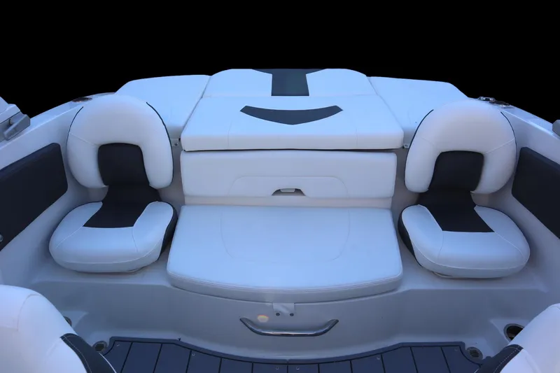 Slide: The Image of 2024 Chaparral 21 SSi Ski & Fish OB boat interior with white and black seating. - 9