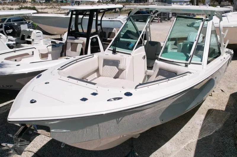 Slide: The Image of 2025 Sailfish 276 DC boat with sleek design and spacious seating. - 0