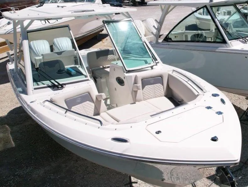 Slide: The Image of 2025 Sailfish 276 DC boat with open bow seating and modern design. - 1