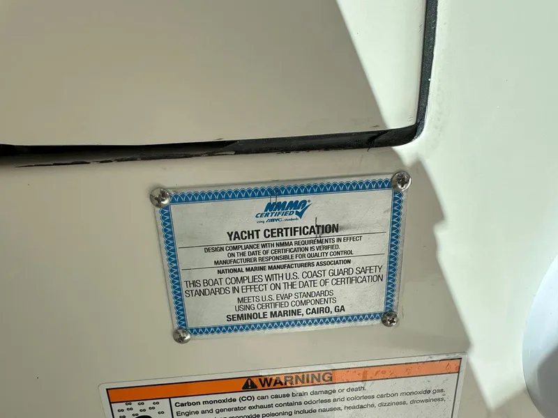 Slide: The Image of Yacht certification plaque on 2025 Sailfish 276 DC, indicating compliance with safety standards. - 40