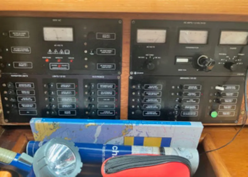 Slide: The Image of Control panel of a 2002 Jeanneau 43DS sailboat with navigation tools. - 11