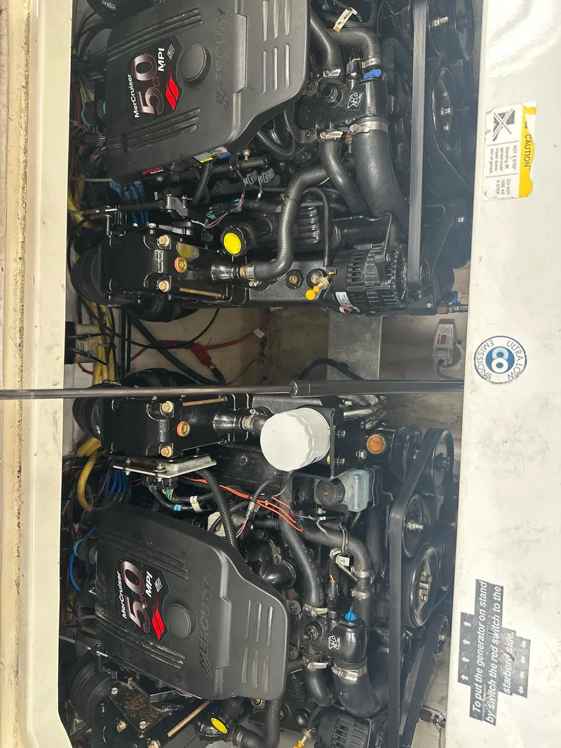 Slide: The Image of Engine compartment of a 2008 Bayliner 300SB with dual MerCruiser 5.0 MPI engines. - 28