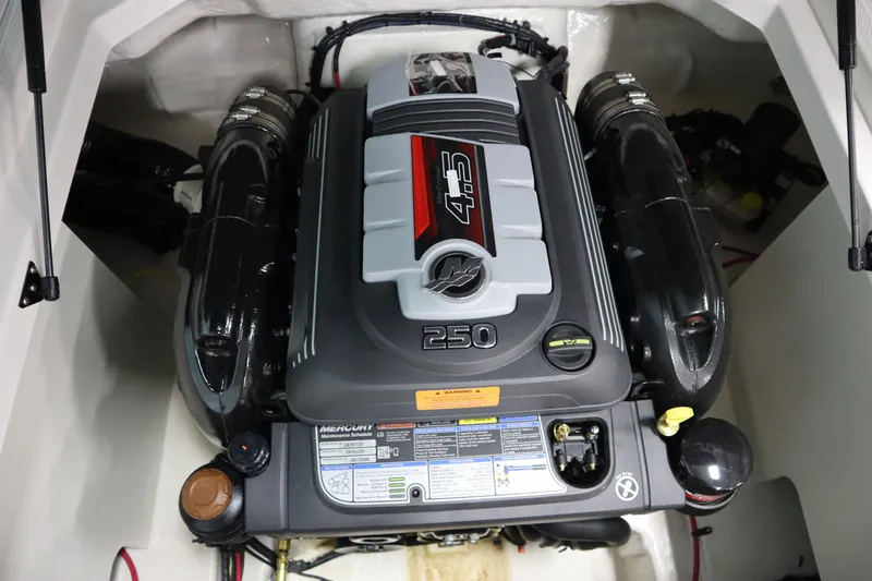 Slide: The Image of 2024 Chaparral 23 SSi boat engine, featuring a powerful 4.5L 250 horsepower motor. - 23