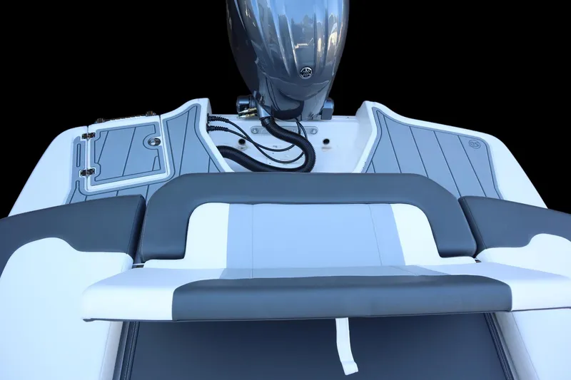 Slide: The Image of 2024 Chaparral 23 SSi OB boat with sleek seating and modern outboard motor. - 15