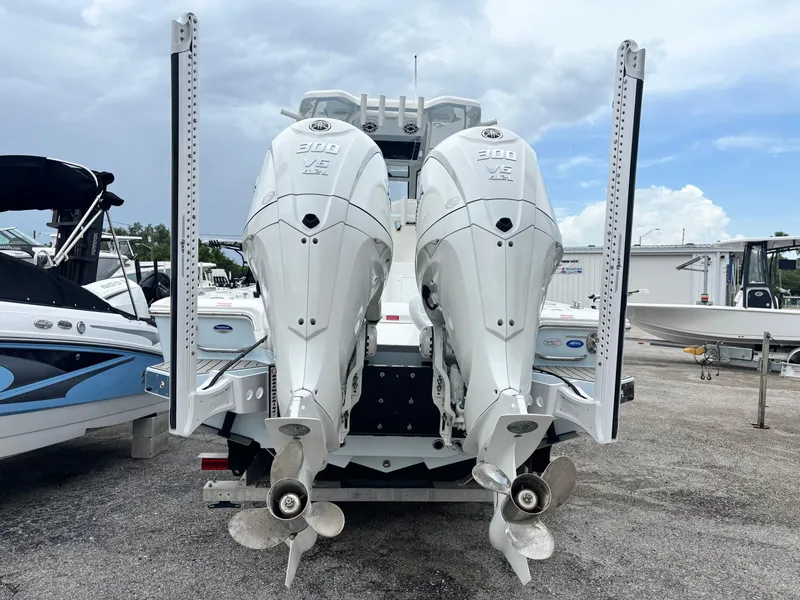 Slide: The Image of Twin Yamaha 300 V6 engines on a 2026 Tidewater 2700 Carolina Bay boat. - 4