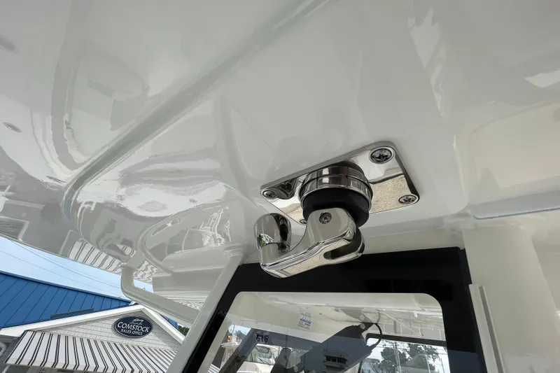 Slide: The Image of 2026 Regulator 25 boat detail showcasing a polished metal fitting on the ceiling. - 20