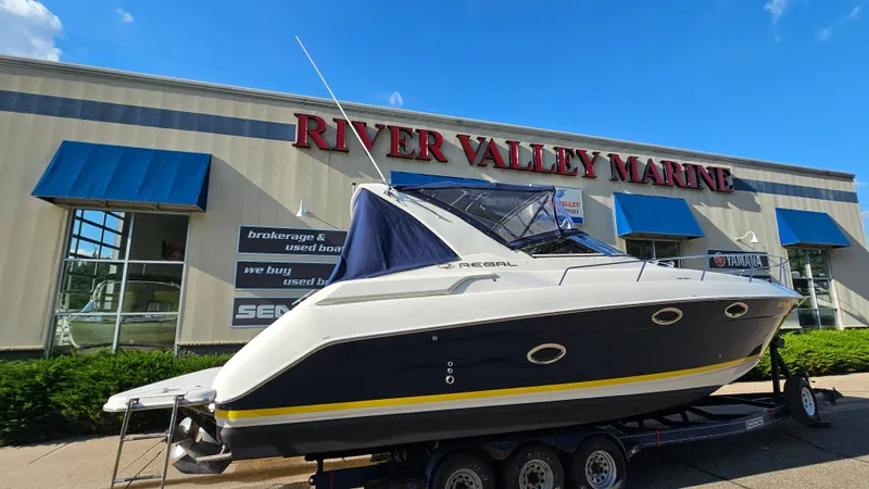 Slide: The Image of 2003 Regal Commodore 3260 boat at River Valley Marine dealership. - 29