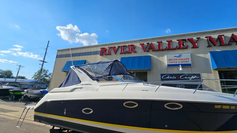 Slide: The Image of 2003 Regal Commodore 3260 boat displayed at River Valley Marine dealership. - 30