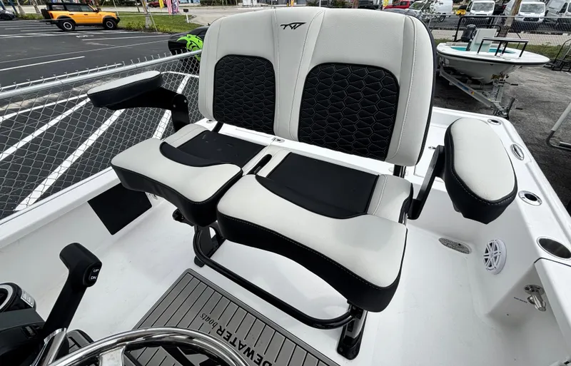 Slide: The Image of 2026 Tidewater 2210 Carolina Bay boat seating with black and white upholstery. - 11