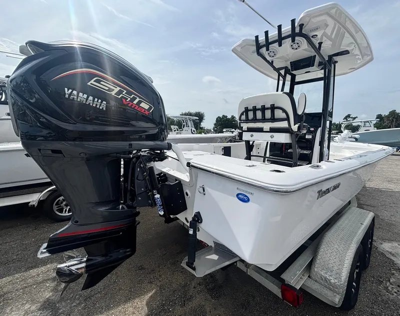 Slide: The Image of 2026 Tidewater 2210 Carolina Bay boat with Yamaha VMAX engine on trailer. - 4