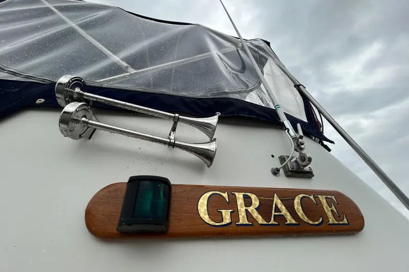 Slide: The Image of Boat named "Grace" with chrome horns, Monk 36 model, 1998. - 19