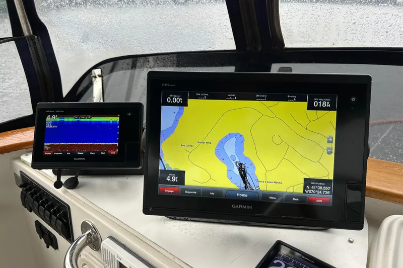Slide: The Image of Boat navigation system with Garmin displays on a 1998 Monk 36 vessel. - 26