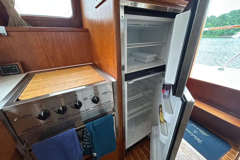 Slide: The Image of Boat kitchen with Mediterranean stove and open fridge, Monk 36, 1998 model. - 47