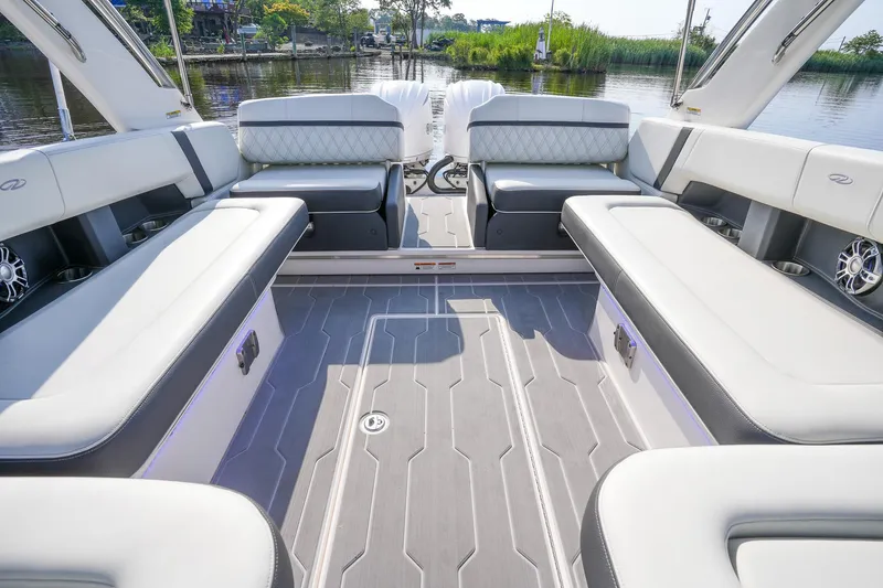 Slide: The Image of 2023 Regal 29 OBX boat interior with spacious seating and modern design. - 21