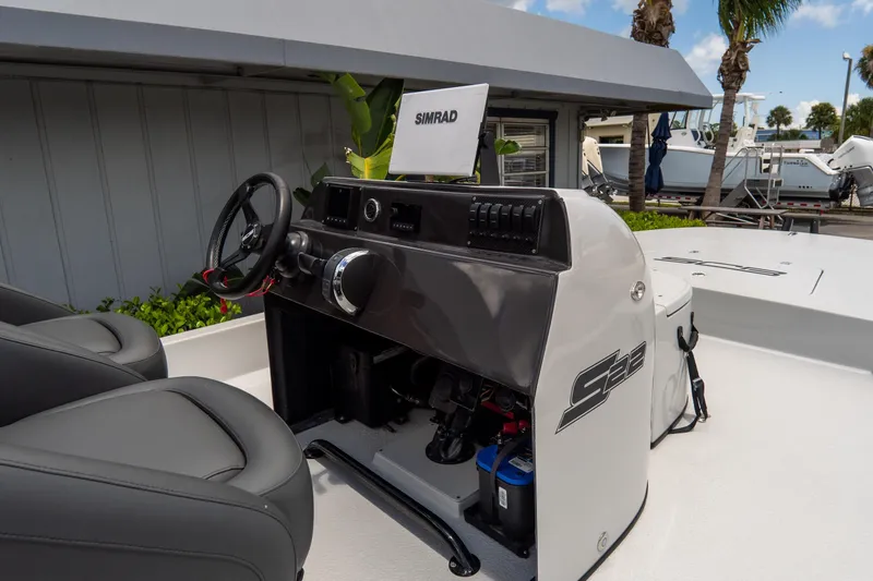 Slide: The Image of 2021 SCB S22 boat console with Simrad display and dual seats. - 11