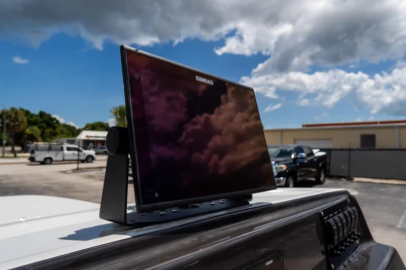 Slide: The Image of 2021 SCB S22 boat with Simrad display under cloudy sky. - 15