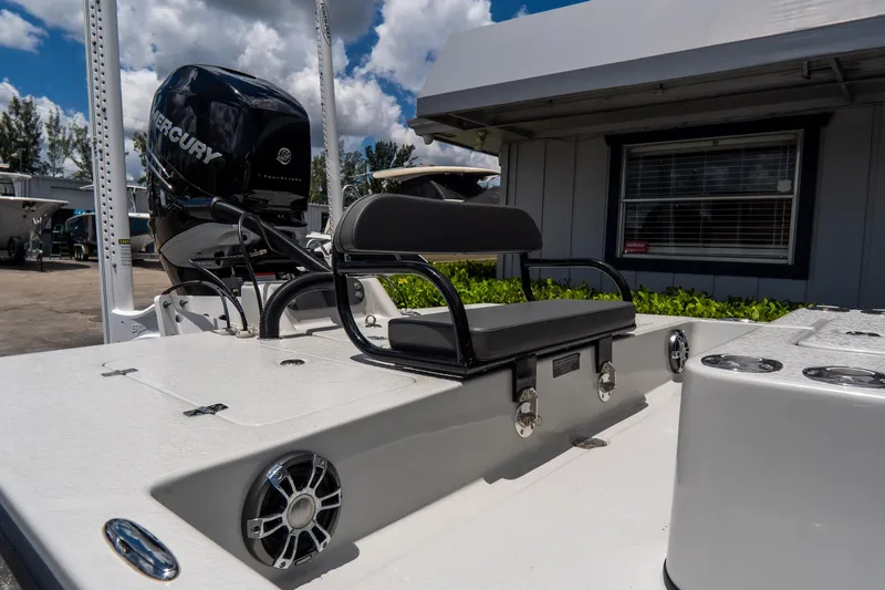 Slide: The Image of 2021 SCB S22 boat with Mercury engine, featuring a sleek seating area and modern design. - 19