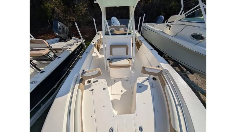 Slide: The Image of 2024 Sea Born LX22 Center Console boat with spacious deck and seating. - 10