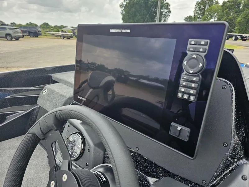 Slide: The Image of Dashboard of 2026 Skeeter ZXE20 boat with Humminbird Xplorer 12 display. - 6
