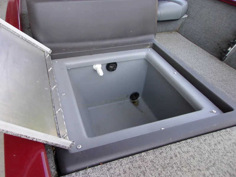 Slide: The Image of Open storage compartment in 2020 Bass Tracker 160 PRO boat. - 10