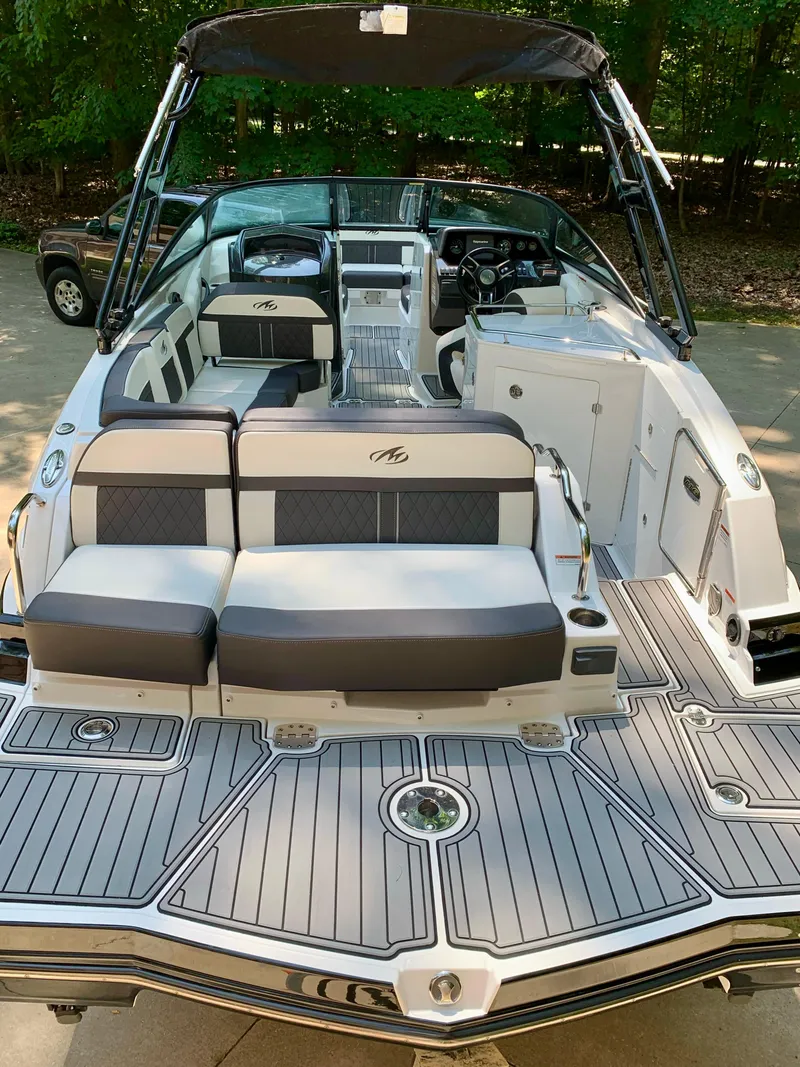 Slide: The Image of 2019 Monterey M6 boat with sleek seating and modern interior design. - 16