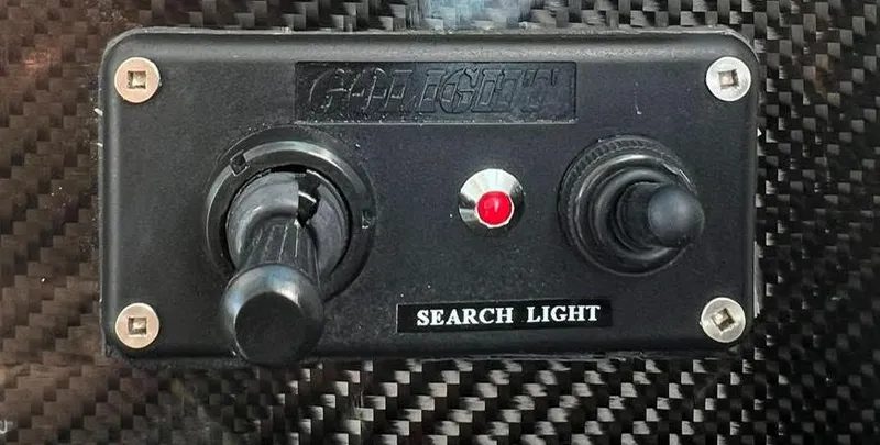 Slide: The Image of Control panel for search light on 2000 Protector Targa 28 boat. - 19