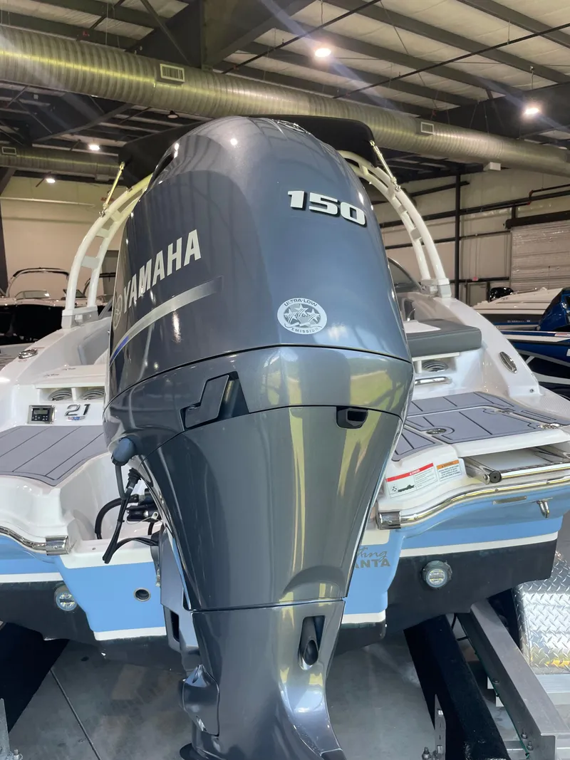 Slide: The Image of 2023 Chaparral 21 SSi OB with Yamaha 150 outboard engine in showroom. - 6