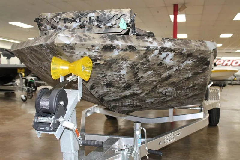 Slide: The Image of Control panel of 2026 Excel 1860 Viper F4 boat with camouflage design and capacity label. - 5