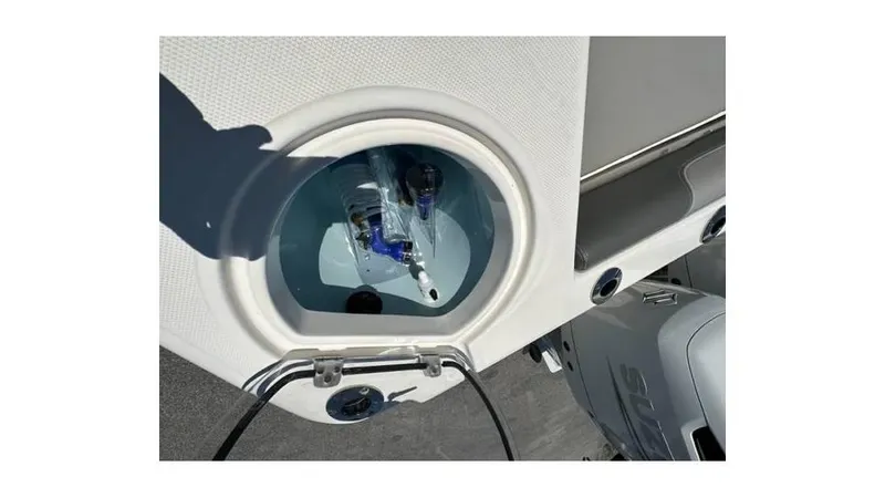 Slide: The Image of 2024 Sea Born FX25 Bay boat livewell with plumbing and fittings. - 15