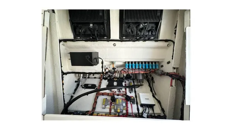 Slide: The Image of 2024 Sea Born FX25 Bay boat electrical system with wiring and components. - 25