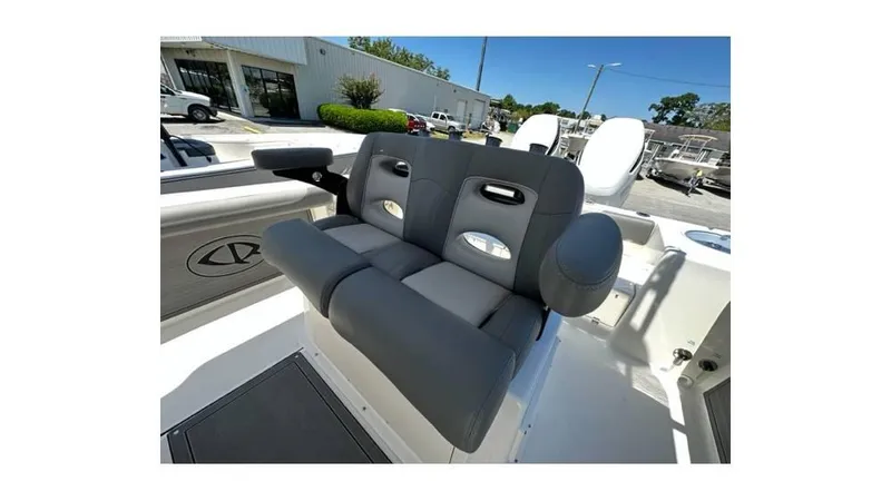 Slide: The Image of 2024 Sea Born FX25 Bay boat with comfortable gray seating and modern design. - 7