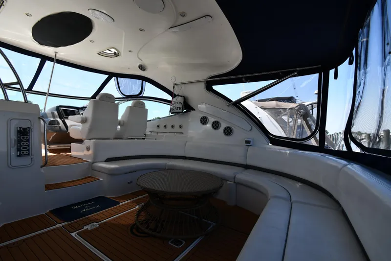Slide: The Image of 2005 Cruisers Yachts 520 Express interior with seating and helm station. - 22