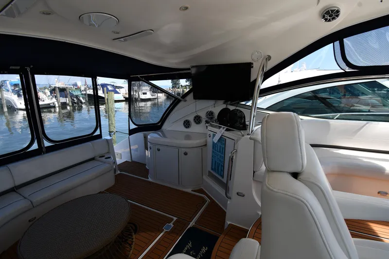Slide: The Image of Interior of 2005 Cruisers Yachts 520 Express with seating and helm station. - 27