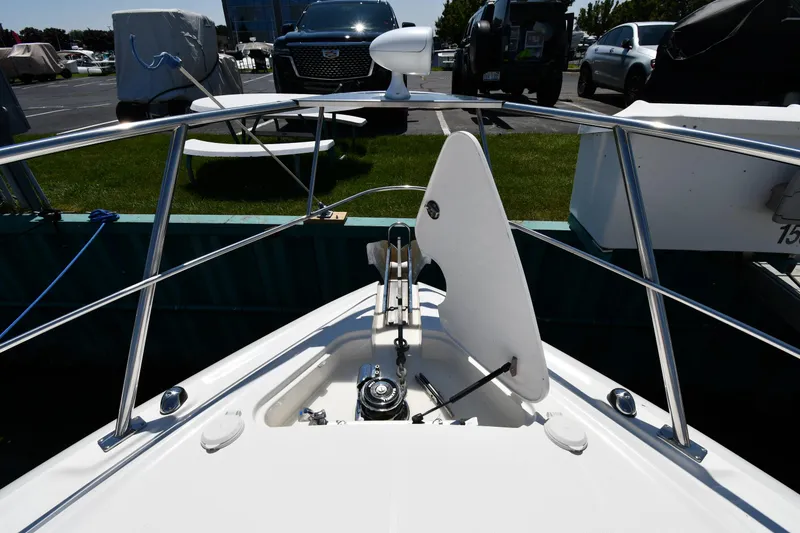 Slide: The Image of 2005 Cruisers Yachts 520 Express bow with anchor and railing. - 5
