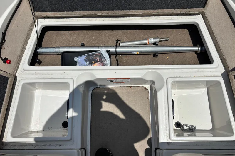 Slide: The Image of 2013 Nitro Z7 Sport boat storage compartment with equipment and accessories. - 4