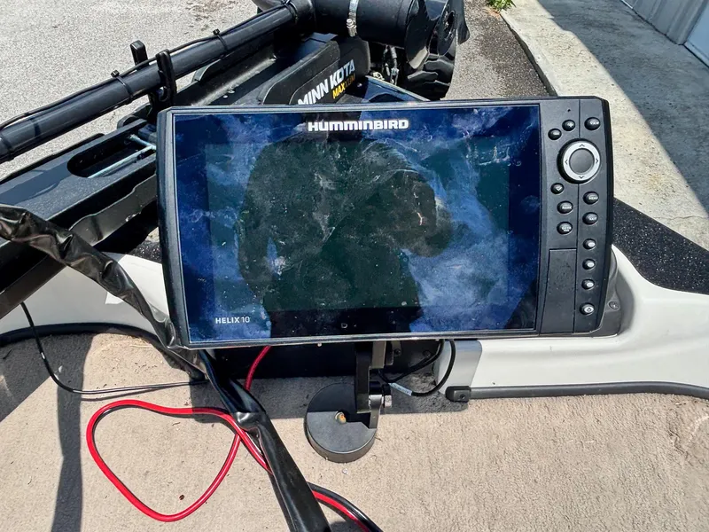 Slide: The Image of Humminbird Helix 10 fish finder on a 2013 Nitro Z7 Sport boat. - 5