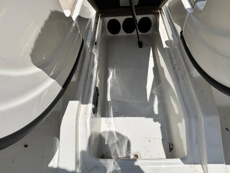 Slide: The Image of Interior view of a 2013 Nitro Z7 Sport boat, showing storage compartment details. - 6
