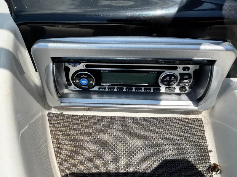 Slide: The Image of Boat stereo system in a 2013 Nitro Z7 Sport, featuring Jensen MSR3012 model. - 8