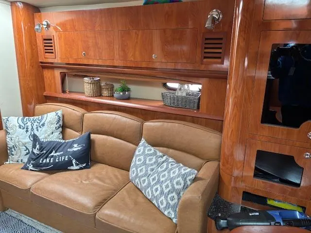 Slide: The Image of Interior of 2007 Four Winns 378 Vista yacht with leather seating and wooden cabinetry. - 18