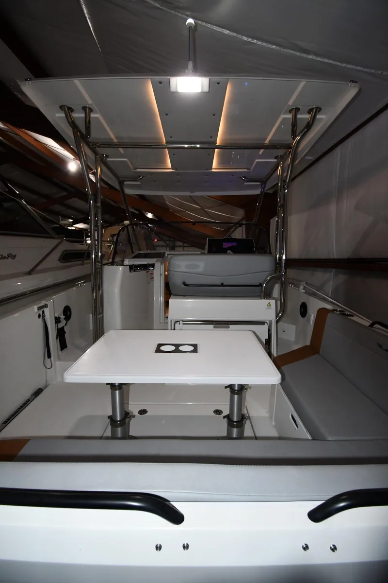 Slide: The Image of 2023 Beneteau Flyer 9 SUNdeck interior with seating and table. - 18