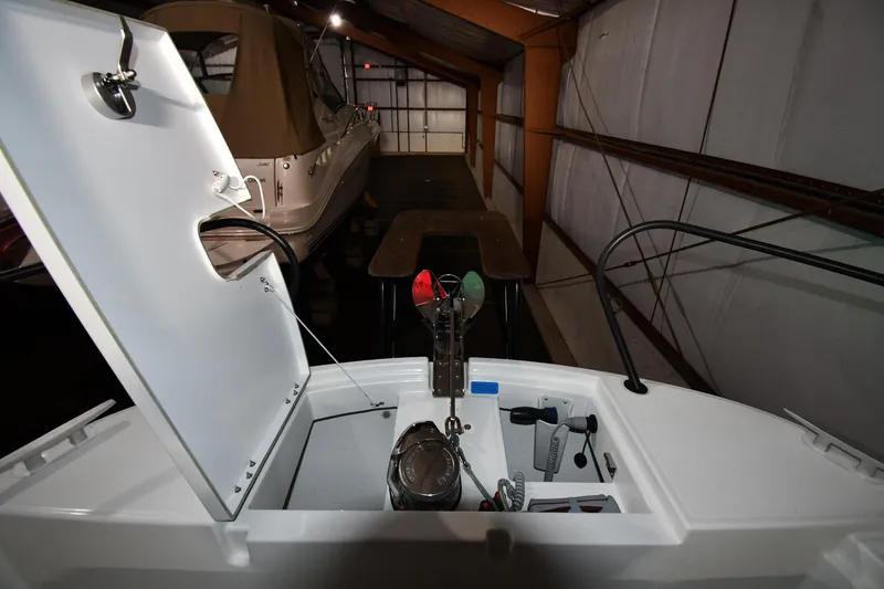 Slide: The Image of 2023 Beneteau Flyer 9 SUNdeck boat interior with open storage compartment. - 19