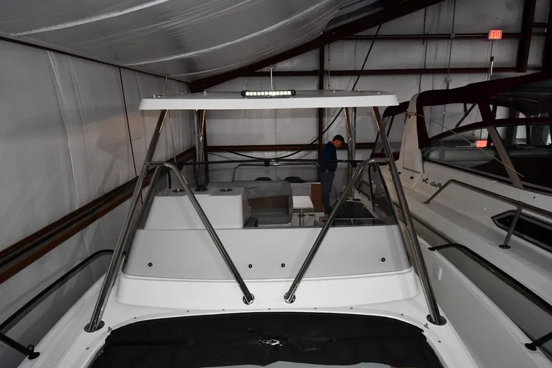 Slide: The Image of 2023 Beneteau Flyer 9 SUNdeck in storage, showcasing sleek design and spacious deck. - 23