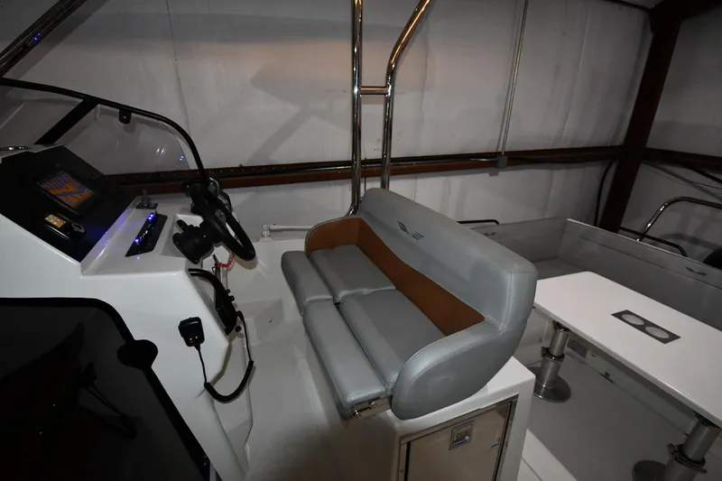 Slide: The Image of Interior view of 2023 Beneteau Flyer 9 SUNdeck with helm and seating area. - 32