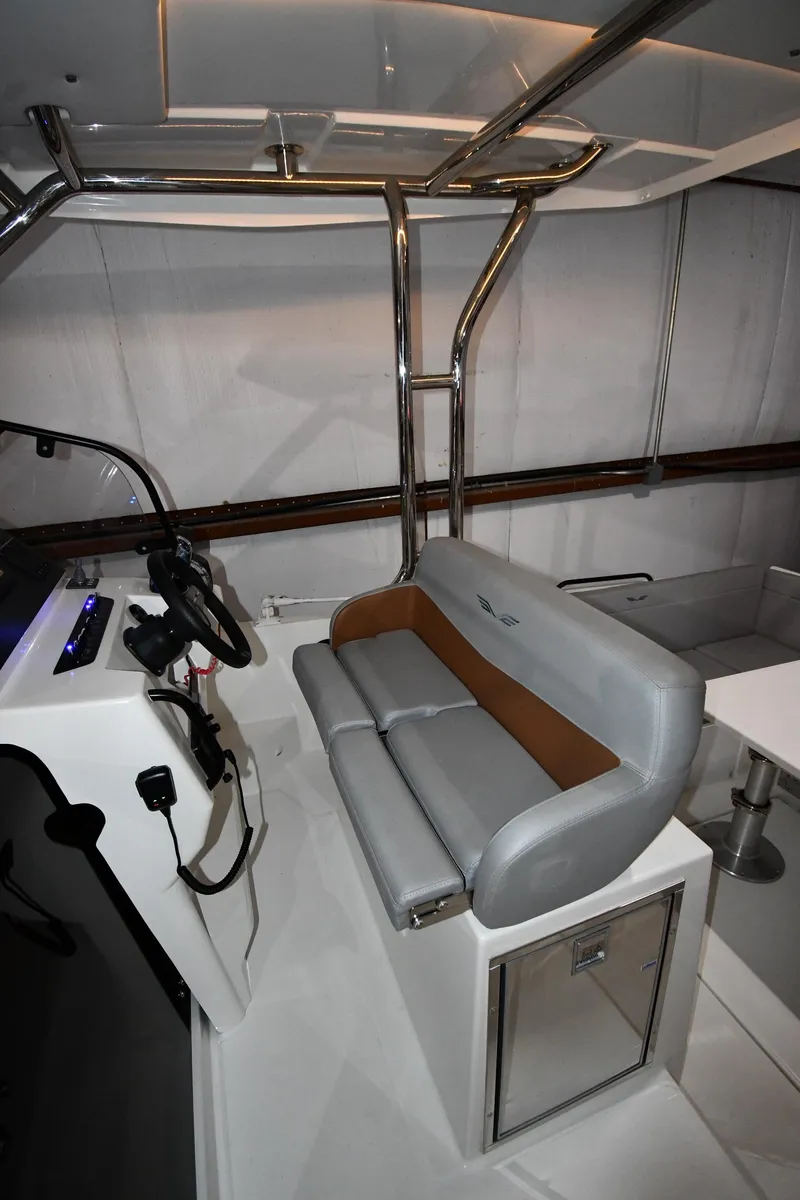 Slide: The Image of 2023 Beneteau Flyer 9 SUNdeck interior with sleek seating and modern helm design. - 33