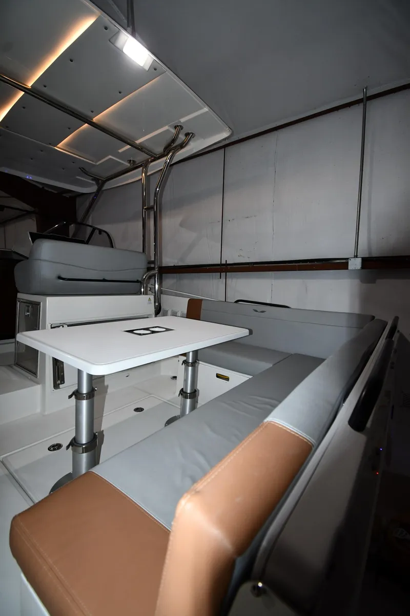 Slide: The Image of 2023 Beneteau Flyer 9 SUNdeck interior with seating and table. - 36